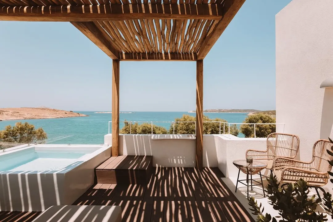 Private pool terrace with a pergola and open sea view at Paros Comfy Suites, near Naoussa